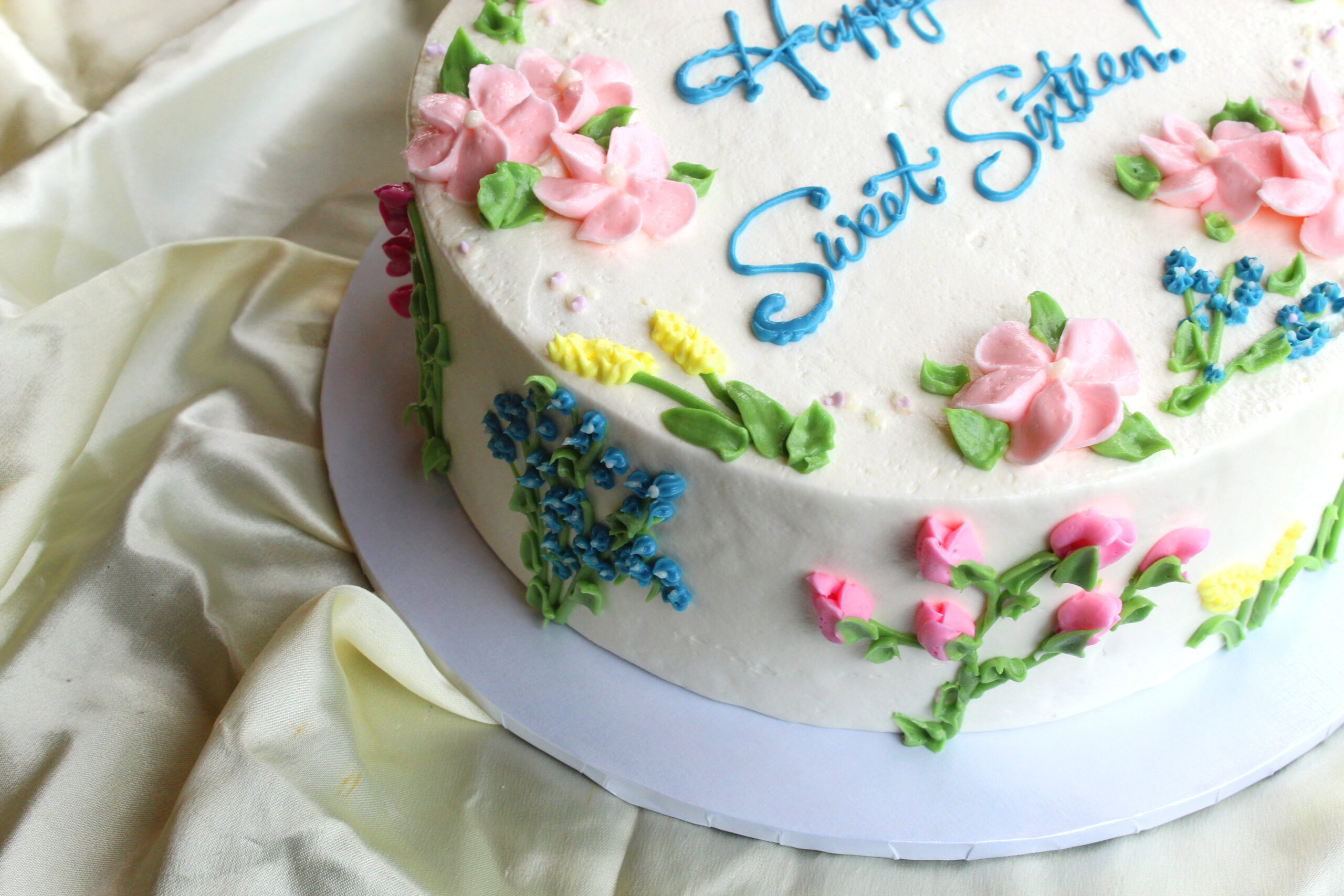 sweet sixteen edit cake flowers